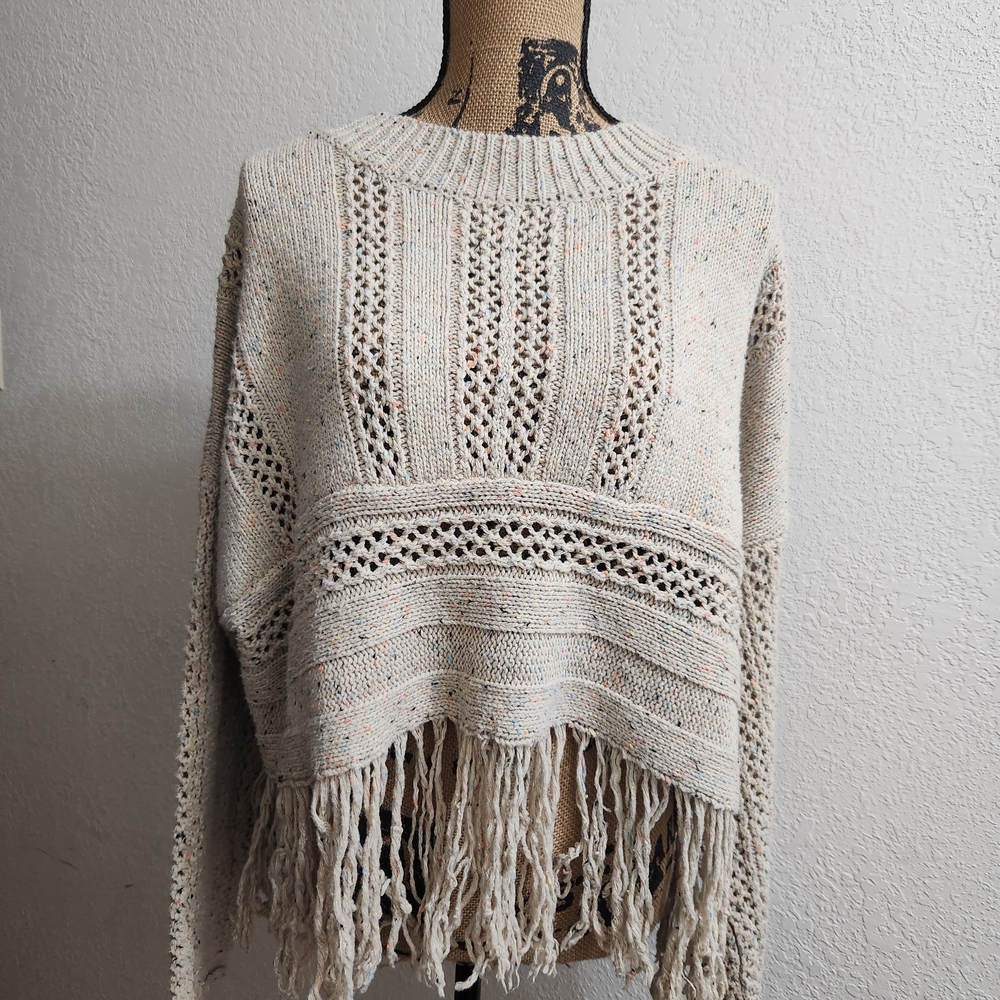 Elegant Cream Knit Sweater with Fringe